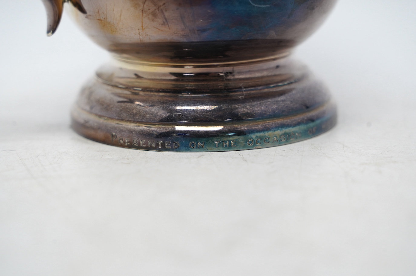 A George V silver baluster mug, with later engraved inscription, Joseph Gloster Ltd, Birmingham, 1934, height 13.8cm, 10.9oz. Condition - fair